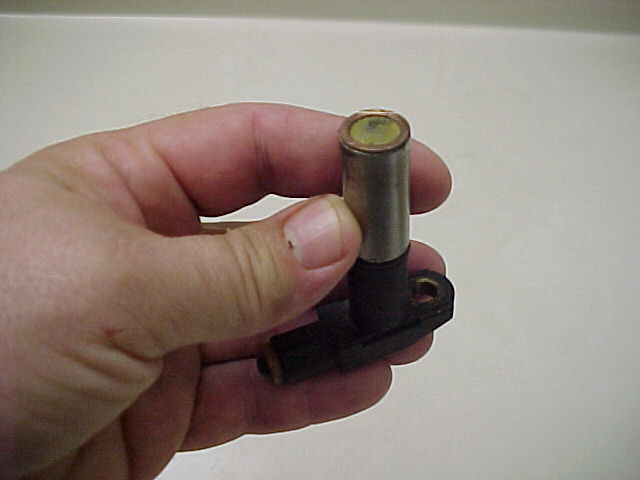 Sensor with washer for clearance setting